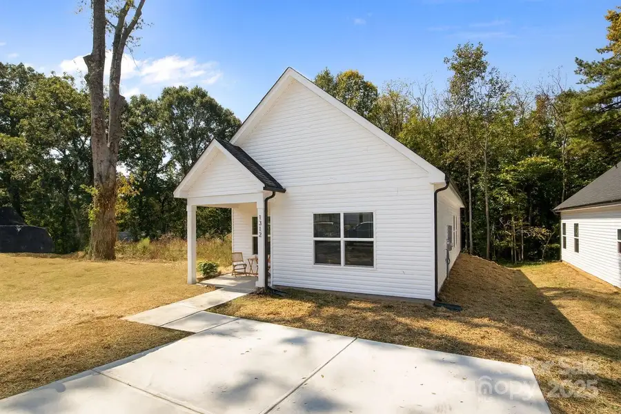 Front exterior of a new home in , Statesville, NC, highlighting curb appeal (Image 1). Front exterior of a new home in , Statesville, NC, highlighting curb appeal (Image 1).