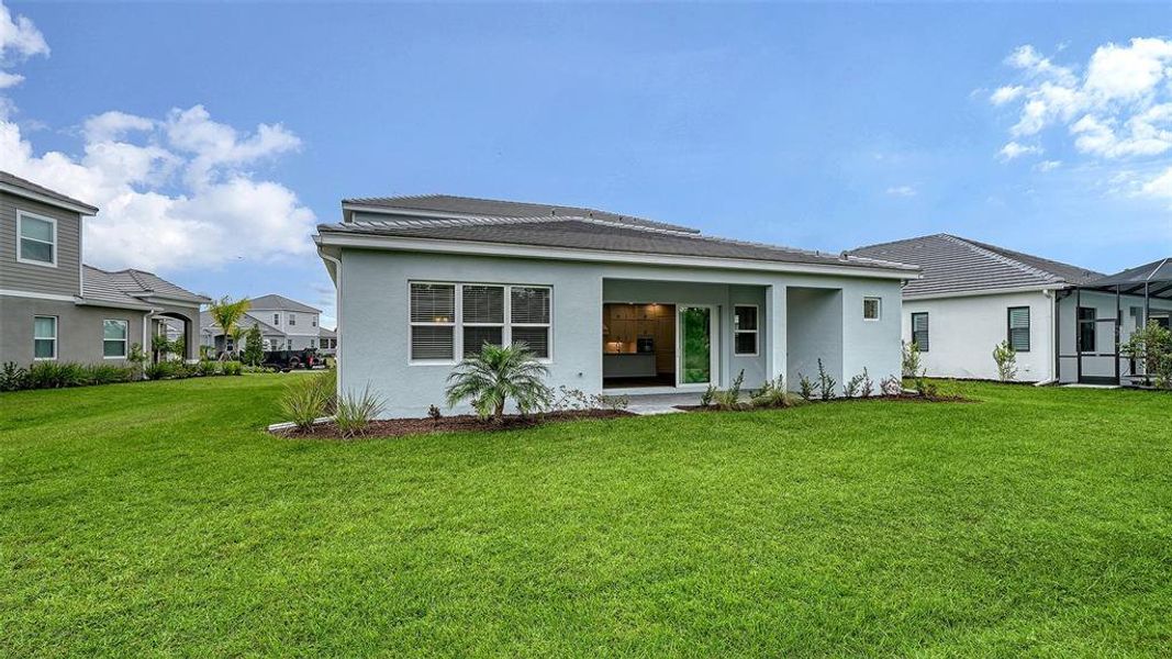 Exterior details and patio area of a home in , Sarasota (Image 25).