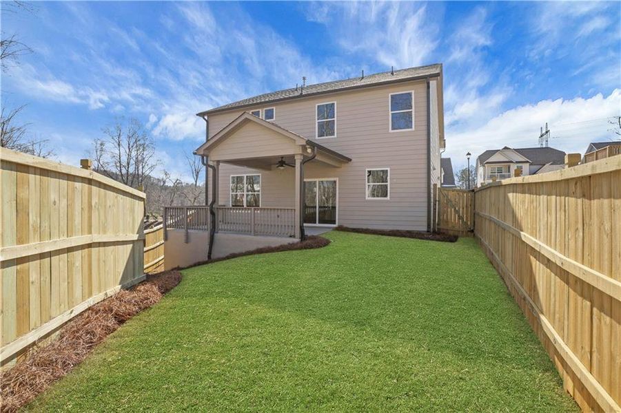 Exterior details and patio area of a home in Marble Tree, Ball Ground (Image 25).