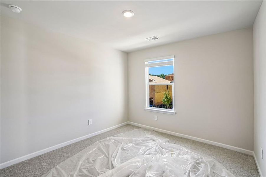 Spacious, unfurnished interior of a new home in Hawthorne Station, College Park (Image 39).