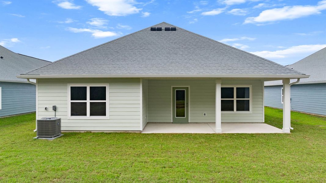 Exterior details and patio area of a home in Buffer Farms, Port Saint Joe (Image 15).