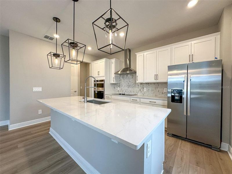 Furnished interior view inside a new home in Silverleaf Reserve Bungalows, Winter Garden (Image 6).
