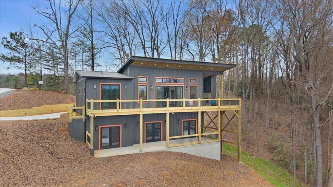 Exterior details and patio area of a home in , Ellijay (Image 19).