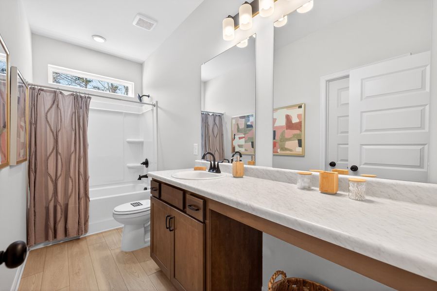 Furnished interior view inside a new home in Summerfield Place, Carrollton (Image 13).