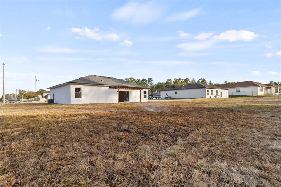 Exterior details and patio area of a home in , Ocala (Image 20).