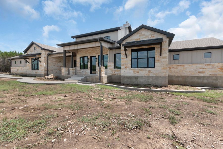 Front exterior of a new home in , Burnet, TX, highlighting curb appeal (Image 1). Front exterior of a new home in , Burnet, TX, highlighting curb appeal (Image 1).