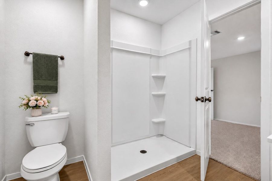 A bright, modern shower creates a comfortable space to start and end your day.