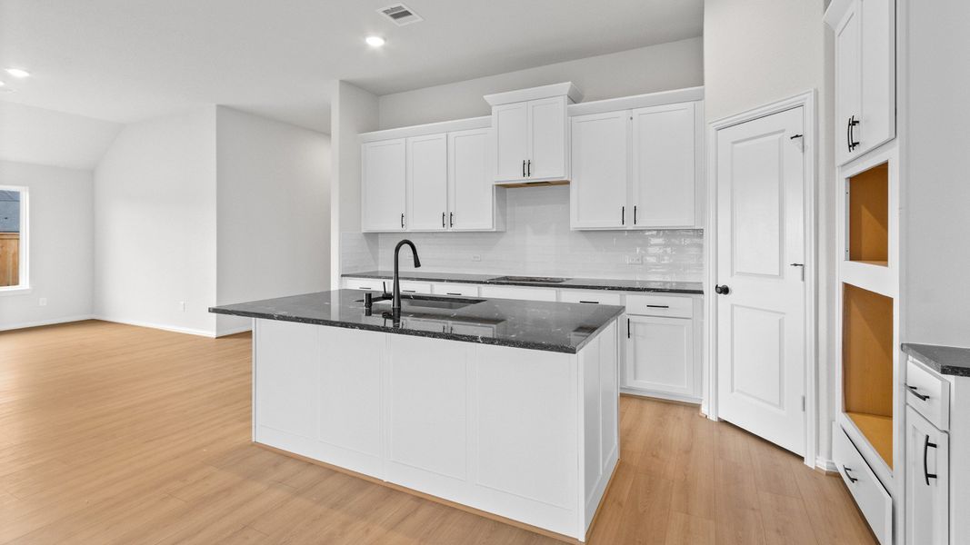 Representative furnished interior of a home built from the Aruba by Brightland Homes in Bridgeland Creekland Village, Cypress (Image 9).