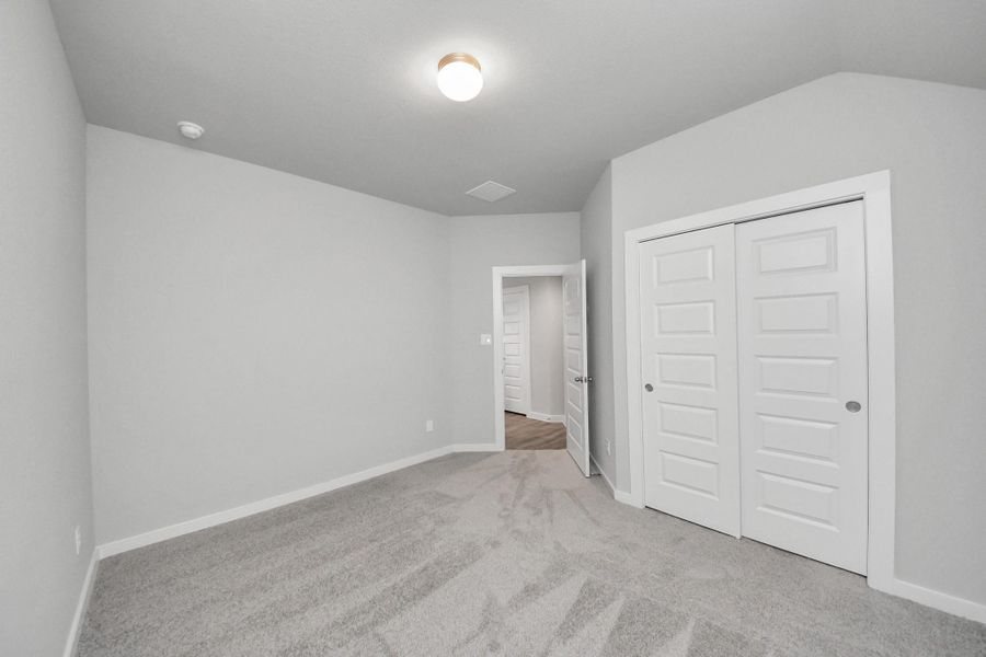 Generously sized secondary bedrooms featuring spacious closets, soft and inviting carpeting underfoot, large windows allowing plenty of natural light, and the added touch of privacy blinds for your personal retreat. Generously sized secondary bedrooms featuring spacious closets, soft and inviting carpeting underfoot, large windows allowing plenty of natural light, and the added touch of privacy blinds for your personal retreat.