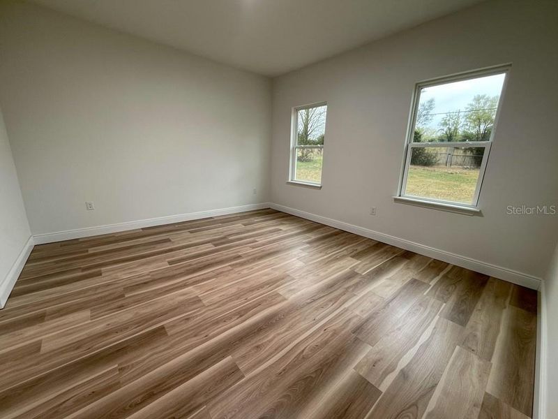 Spacious, unfurnished interior of a new home in , Port Charlotte (Image 18).