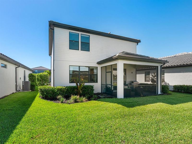 Front exterior of a new home in , Lakewood Ranch, FL, highlighting curb appeal (Image 21).