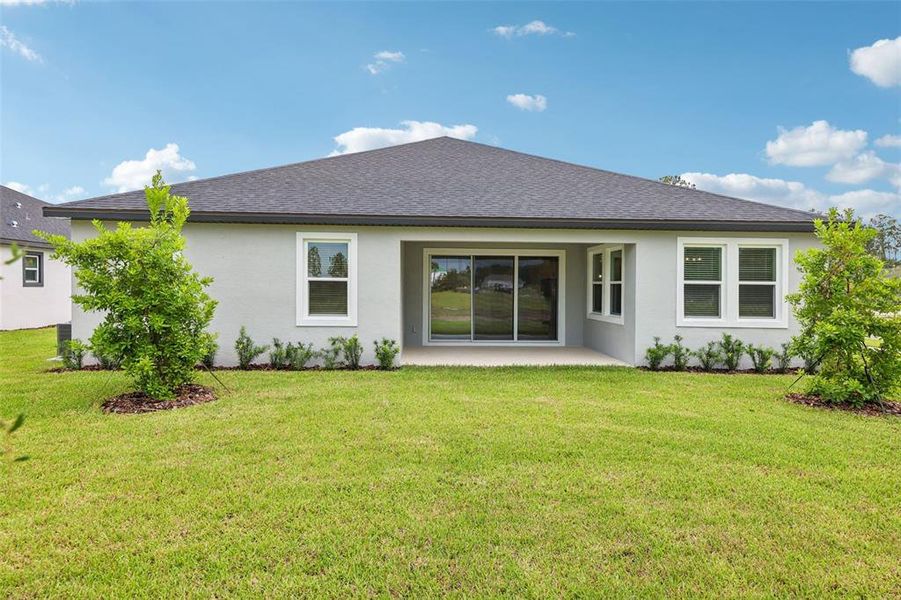 Exterior details and patio area of a home in , Ormond Beach (Image 25).
