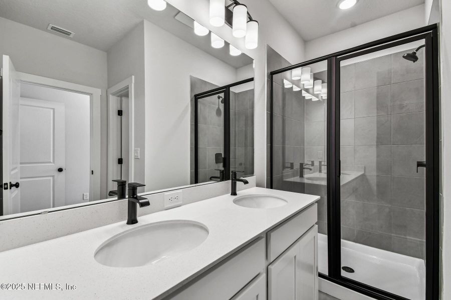 Furnished interior view inside a new home in Kettering at eTown - Garden Collection, Jacksonville (Image 6). Furnished interior view inside a new home in Kettering at eTown - Garden Collection, Jacksonville (Image 6).