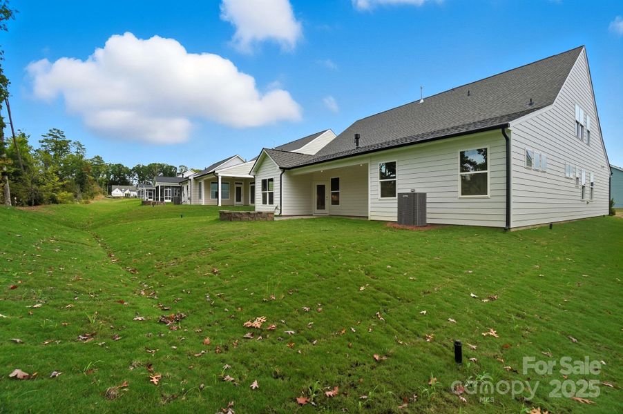 Exterior details and patio area of a home in Heritage - 55+ Community, Indian Trail (Image 2). Exterior details and patio area of a home in Heritage - 55+ Community, Indian Trail (Image 2).