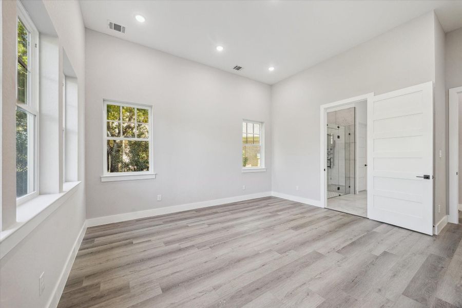From the Primary Bedroom, you enter the Primary Bathroom and Closet