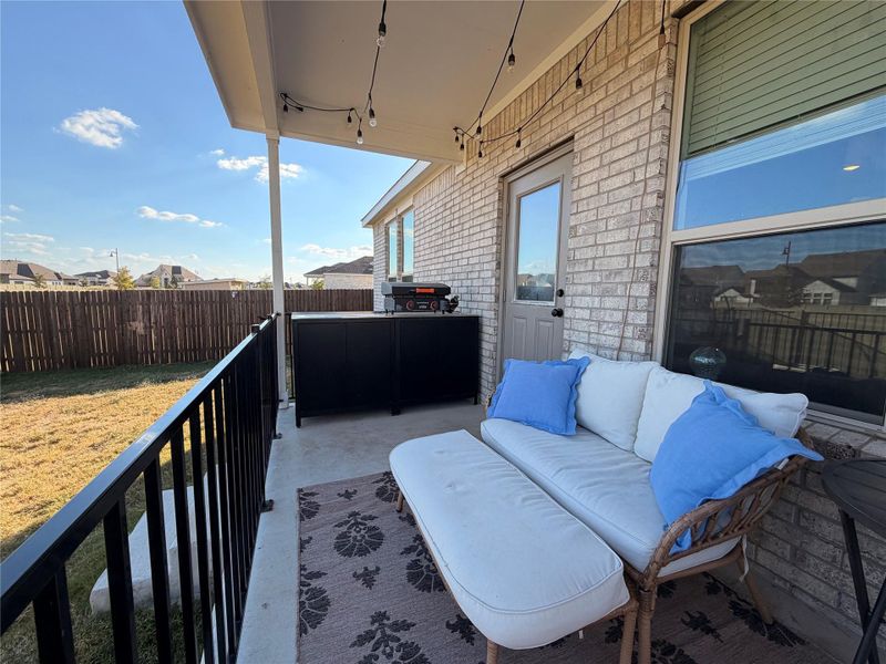 Balcony with an outdoor hangout area Balcony with an outdoor hangout area