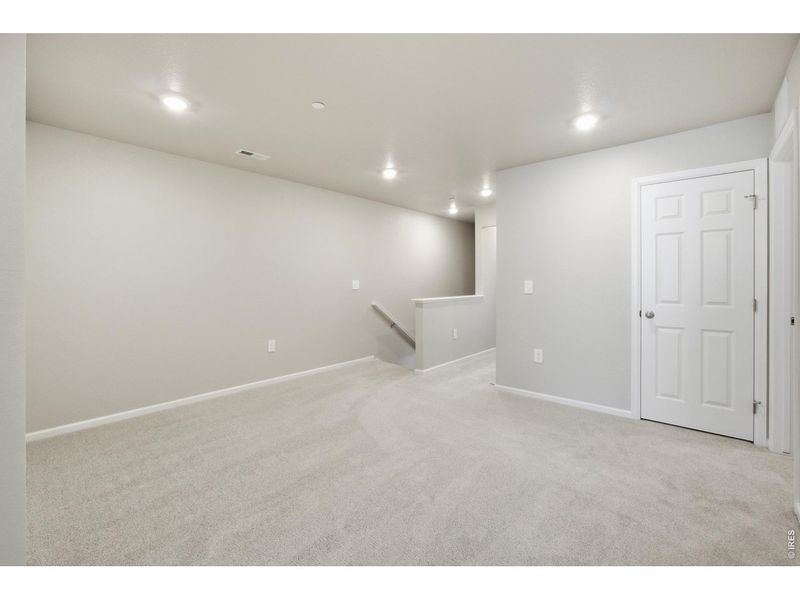 Spacious, unfurnished interior of a new home in Poudre Heights: The Meadow Collection, Windsor (Image 23).