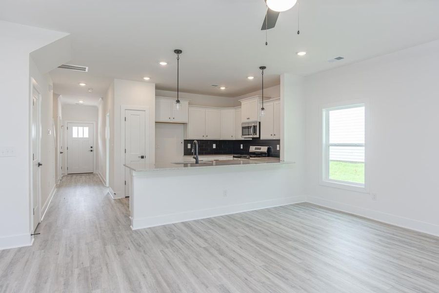 Representative unfurnished interior of a home built from the 1692 Townhome by Adams Homes in Parkstone Place Townhomes, Roebuck (Image 14).