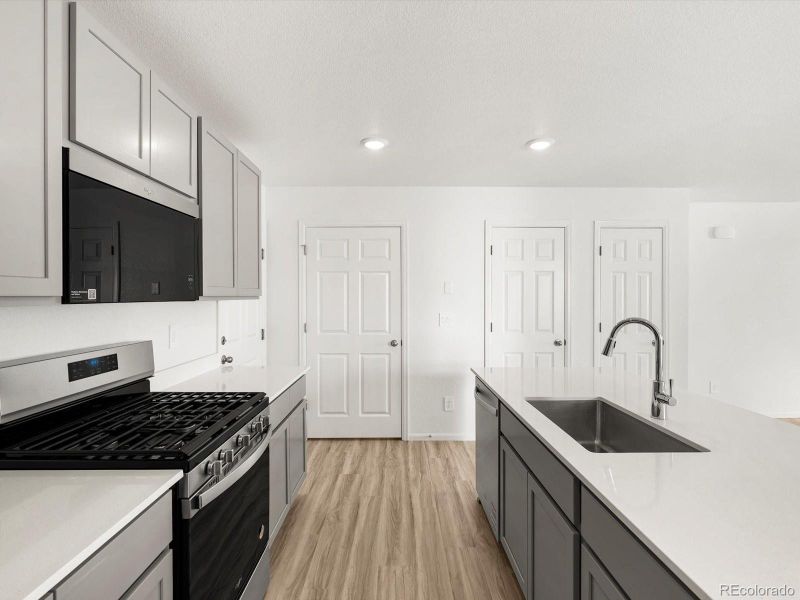 Furnished interior view inside a new home in Skyview at High Point, Aurora (Image 10).