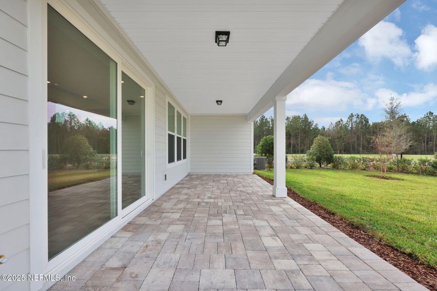 Exterior details and patio area of a home in Del Webb Saint Johns, St. Johns (Image 3).