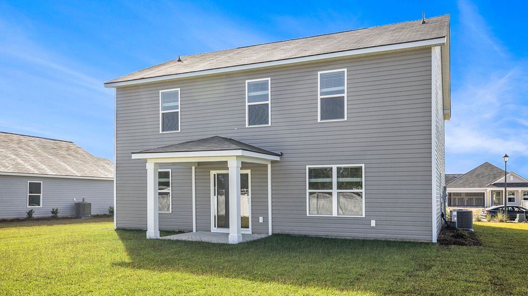Exterior details and patio area of a home in The Bluffs at Mill Creek, Florence (Image 3). Exterior details and patio area of a home in The Bluffs at Mill Creek, Florence (Image 3).