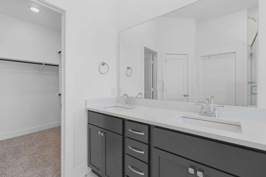 Representative furnished interior of a home built from the Chantilly 2 by Chesmar Homes in Sienna Chateau, Missouri City (Image 9).