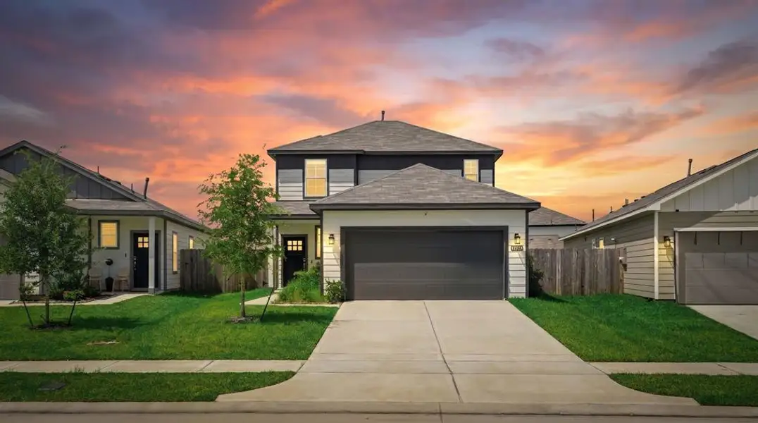 Front exterior of a new home in Paloma at Sanford Farms, Waller, TX, highlighting curb appeal (Image 2). Front exterior of a new home in Paloma at Sanford Farms, Waller, TX, highlighting curb appeal (Image 2).