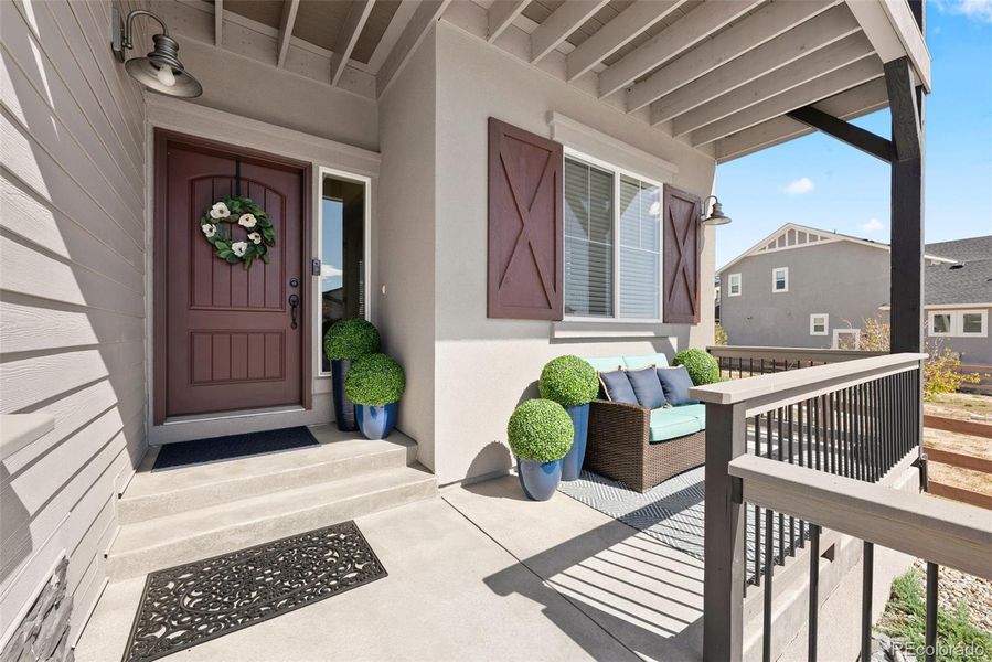 Perfect front porch for relaxing on this perfect cul de sac.