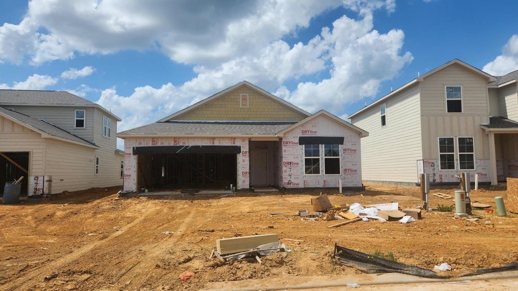 In-progress construction of a new home in Caney Mills, Conroe, TX (Image 19).