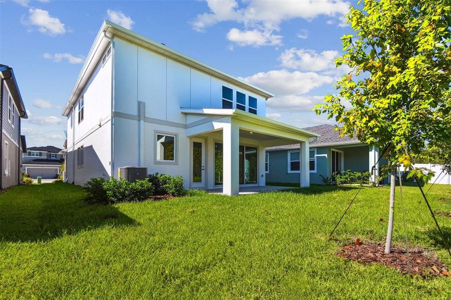 Exterior details and patio area of a home in Chapel Crossings - Garden Series, Wesley Chapel (Image 3).