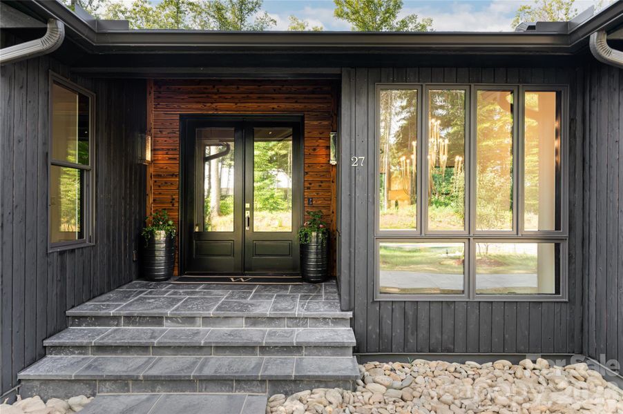 Exterior details and patio area of a home in , Weaverville (Image 28).