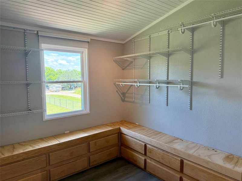Owner uses second bedroom as super sized closet.