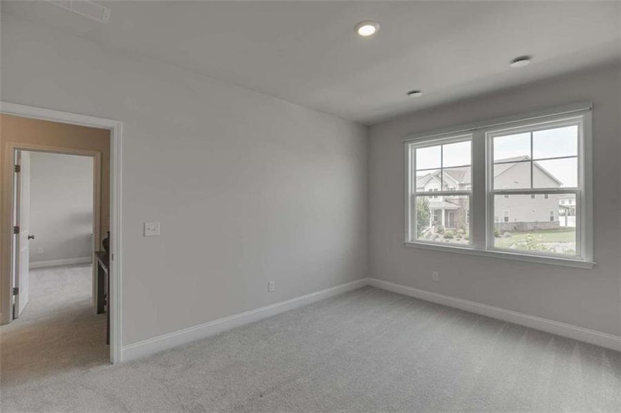 Spacious, unfurnished interior of a new home in Overlook at Lanier, Buford (Image 49).
