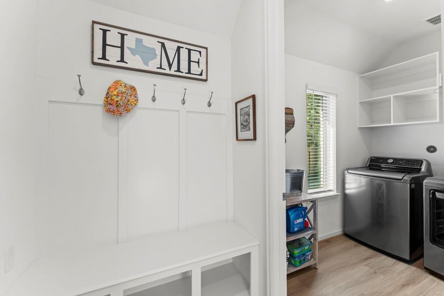 The mud room is just off the entrance to the home and is the perfect drop space for you and/or your guests.