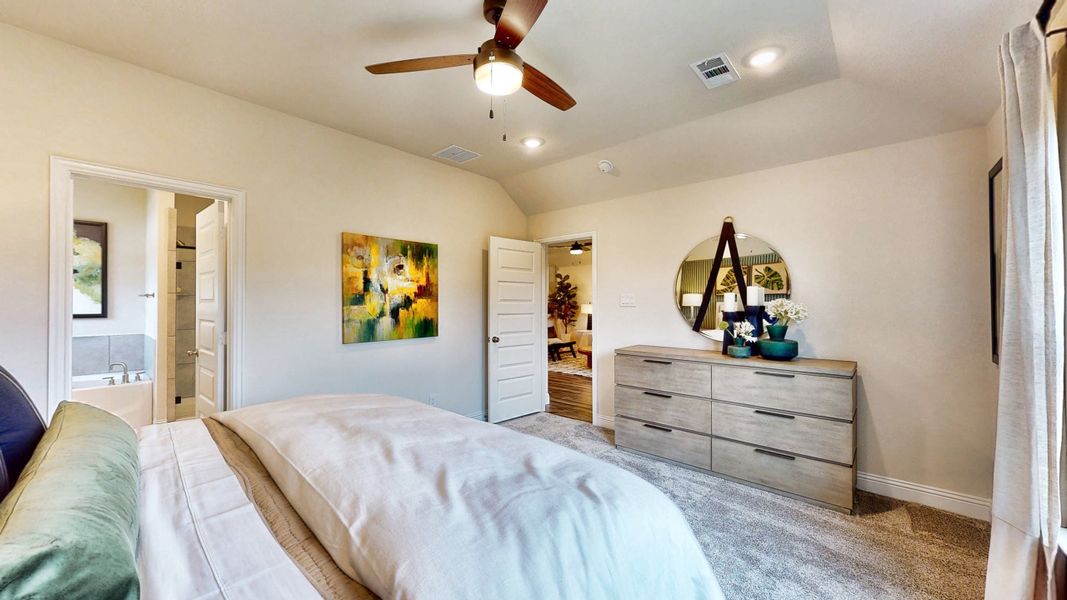 A bedroom with a bed and a dresser. A bedroom with a bed and a dresser.