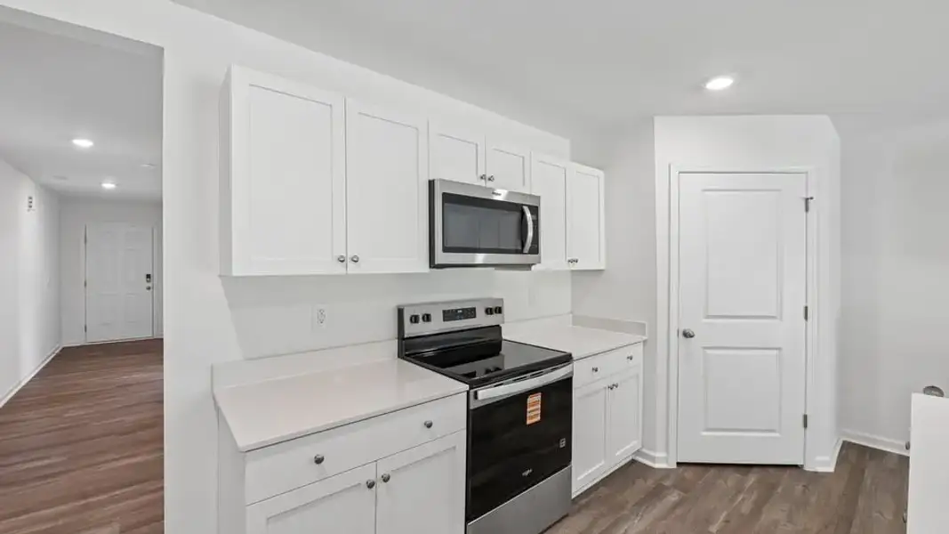 Furnished interior view inside a new home in Mangum Farms, Stem (Image 7).