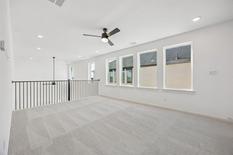 This light, bright and airy game room is the perfect place to host those big game day parties!