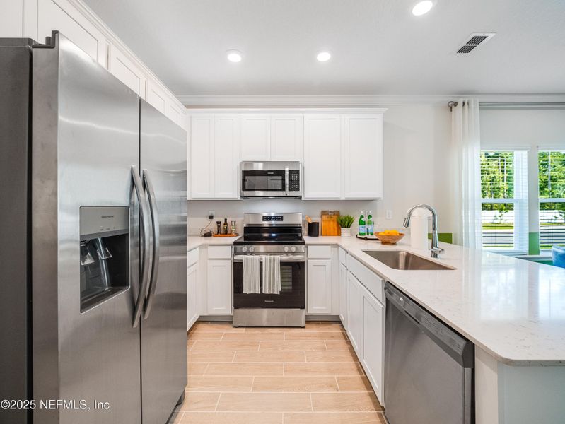 Furnished interior view inside a new home in Silver Falls Townhomes at Silverleaf, St. Augustine (Image 10). Furnished interior view inside a new home in Silver Falls Townhomes at Silverleaf, St. Augustine (Image 10).
