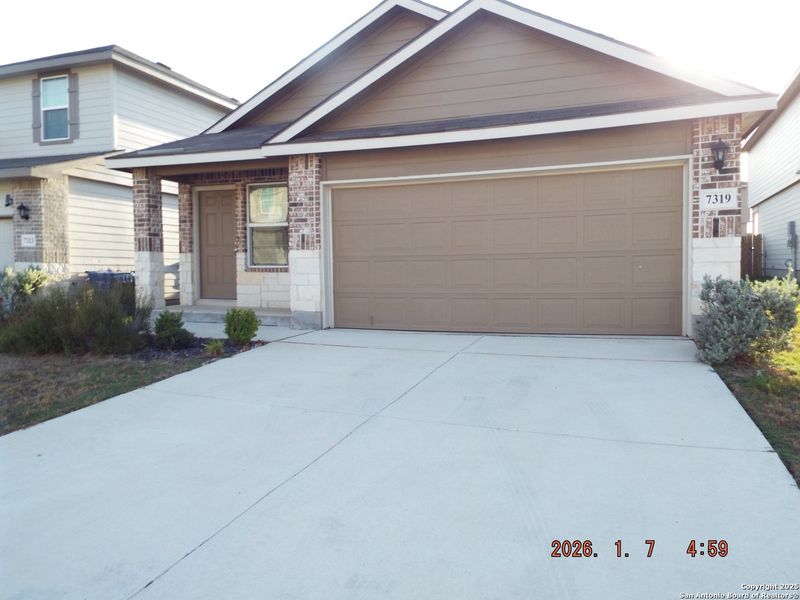 Front exterior of a new home in Salado Creek, San Antonio, TX, highlighting curb appeal (Image 1). Front exterior of a new home in Salado Creek, San Antonio, TX, highlighting curb appeal (Image 1).