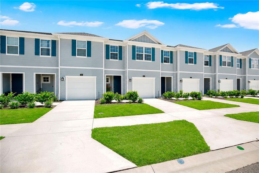 Front exterior of a new home in , Palm Coast, FL, highlighting curb appeal (Image 22).