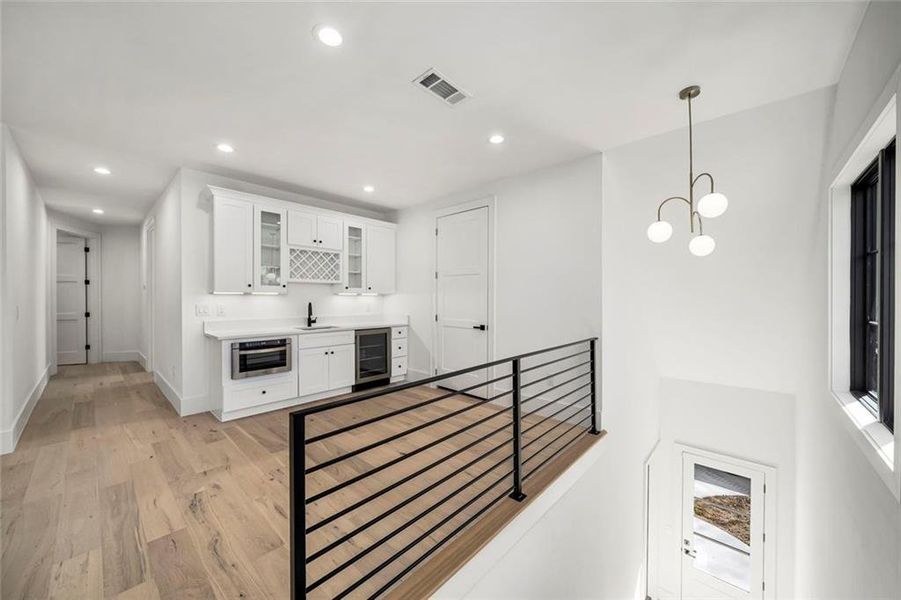 Furnished interior view inside a new home in , Alpharetta (Image 60).