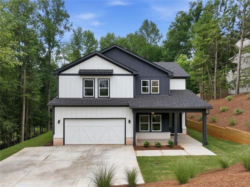 Front exterior of a new home in , Gainesville, GA, highlighting curb appeal (Image 1). Front exterior of a new home in , Gainesville, GA, highlighting curb appeal (Image 1).