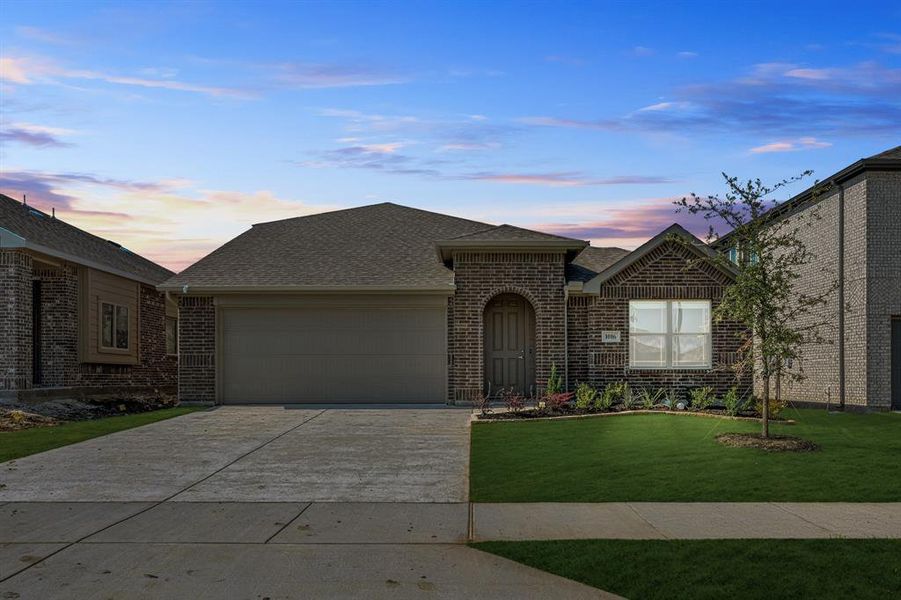 Front exterior of a new home in Eagle Glen Elements, Alvarado, TX, highlighting curb appeal (Image 18). Front exterior of a new home in Eagle Glen Elements, Alvarado, TX, highlighting curb appeal (Image 18).