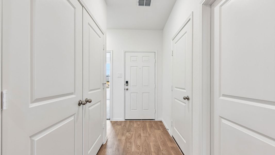 Spacious, unfurnished interior of a new home in Wayside, Uhland (Image 27).