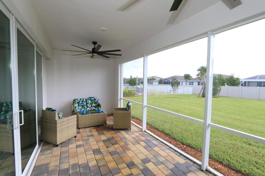 Exterior details and patio area of a home in Del Webb Tradition, Port St. Lucie (Image 4).