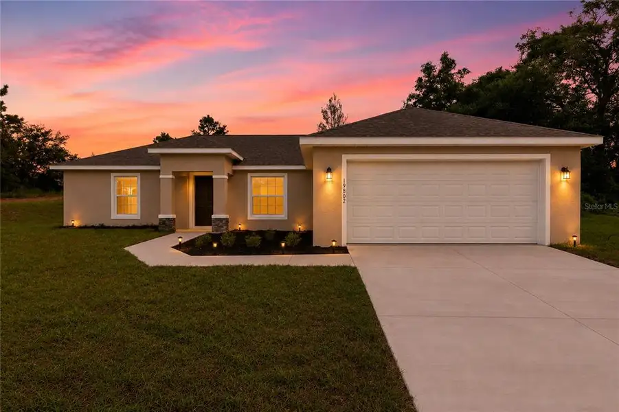 Front exterior of a new home in , Dunnellon, FL, highlighting curb appeal (Image 26).