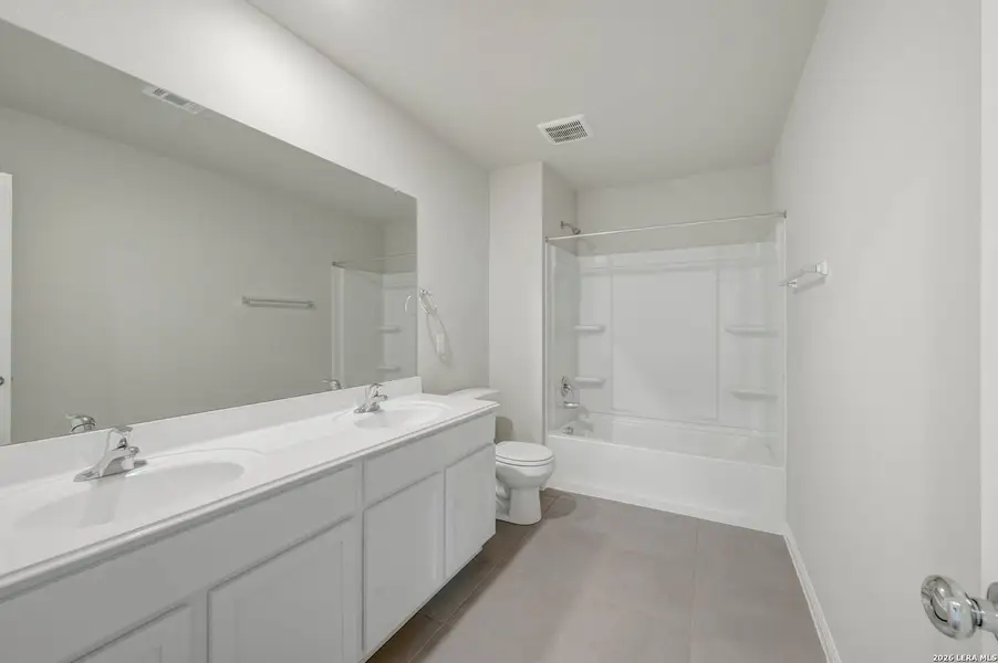 Furnished interior view inside a new home in Mesquite Ridge, San Antonio (Image 9).