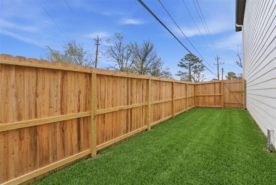 Exterior details and patio area of a home in , Houston (Image 3).