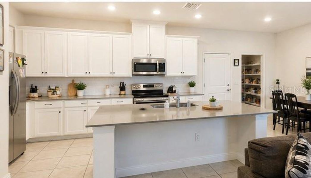 Furnished interior view inside a new home in , St. Cloud (Image 10).
