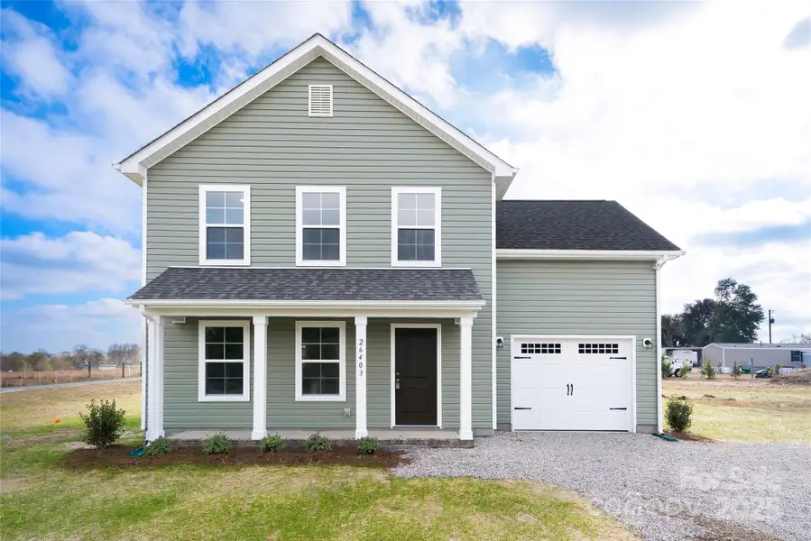 Front exterior of a new home in , Pageland, SC, highlighting curb appeal (Image 1). Front exterior of a new home in , Pageland, SC, highlighting curb appeal (Image 1).